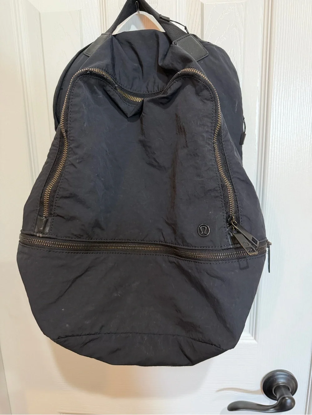 Lululemon Black Backpack with Multiple Zipper Pockets *read notes